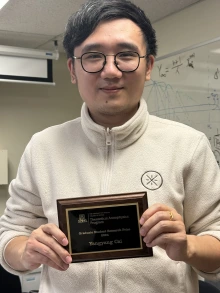 Yangyang Cai received 2025 Grad Student Research plaque